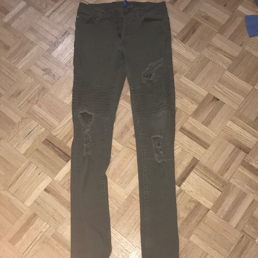 Ripped army green skinny jeans